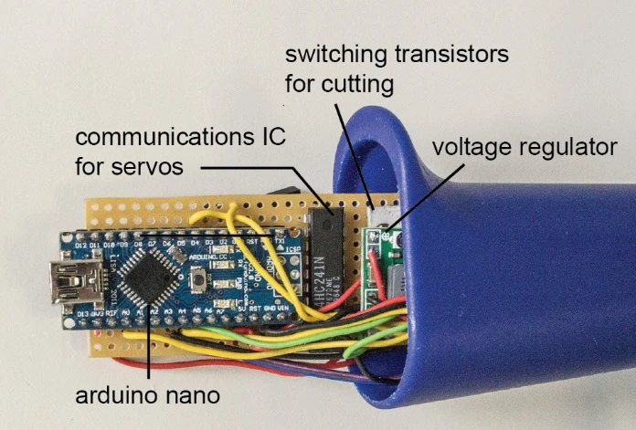 The Arduino control and supporting electronics are housed in the handle of the device
