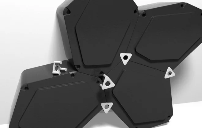 Build units are pinned together using simple triangle clips with protruding prongs