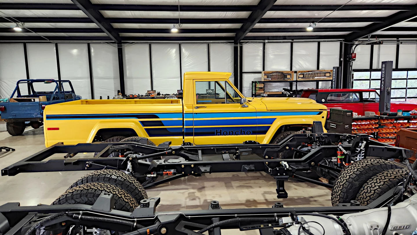 Daniel's Honcho sits behind two recently-arrived custom frames for Vigilante retomods
