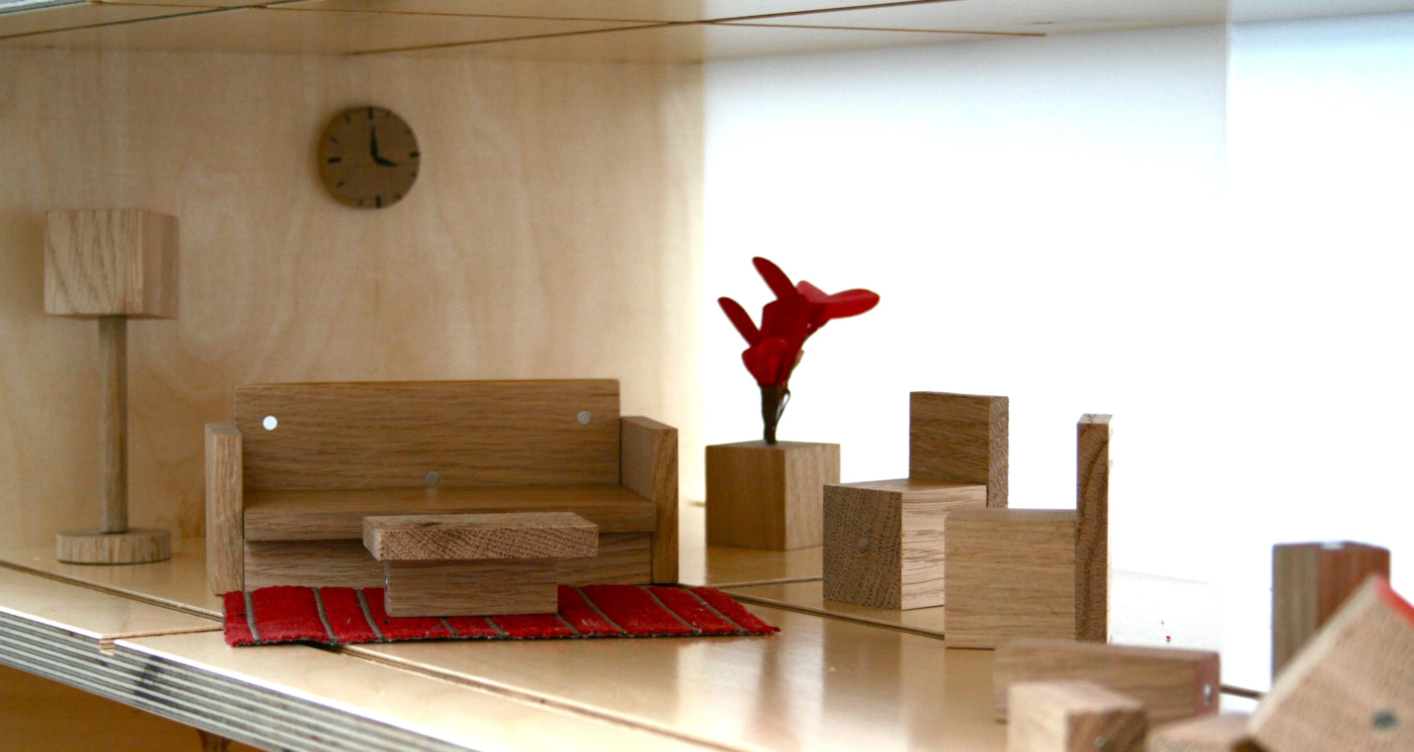 Magnetic oak furniture sets are available to easily add rooms to your Qubis Haus coffee table