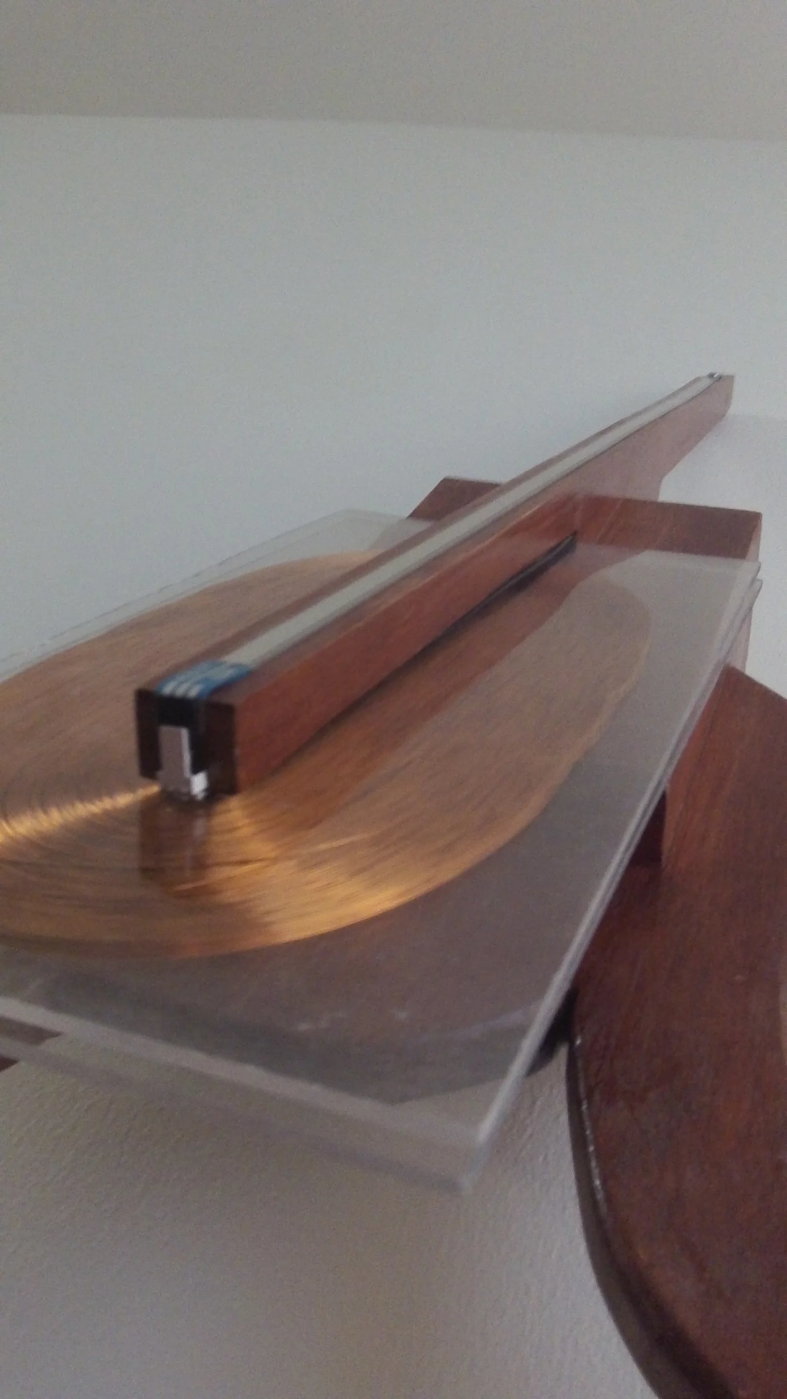 The bow switches select a tuning for the instrument, and pressing down on the resistive ribbon in different places along its length changes its output voltage