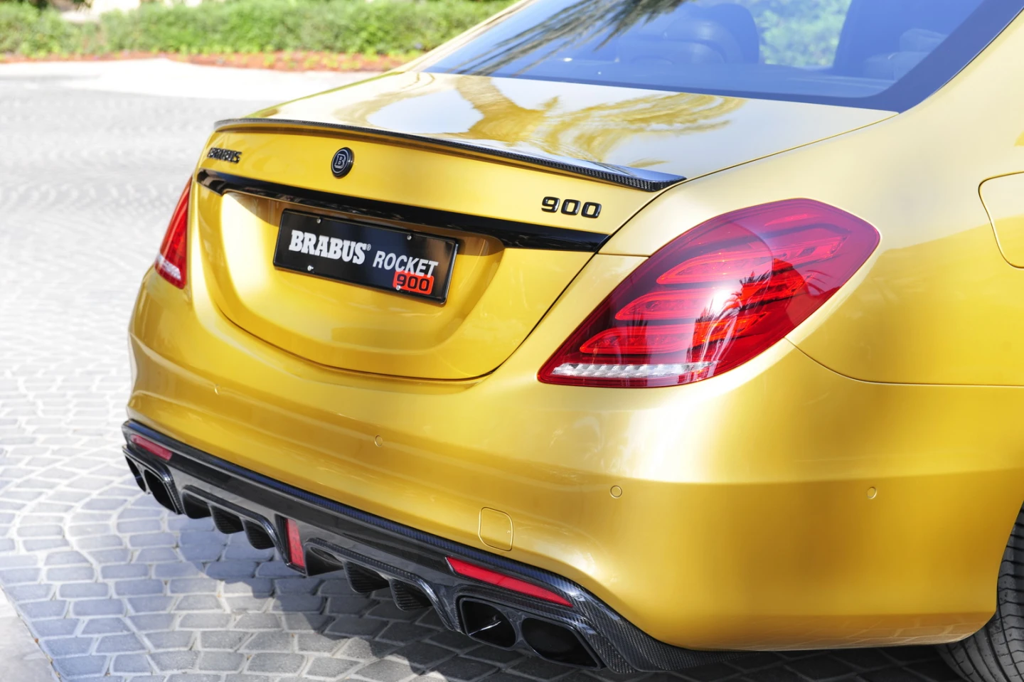 The rear spoiler is carbon fiber and designed to stabilize the vehicle at high speeds