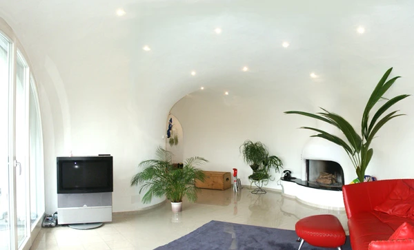The interiors of the Earth Houses by Vetsch Architektur are as homely and comfortable as more traditional buildings
