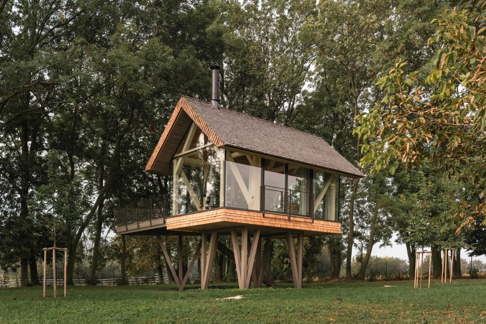 Prague based architectural firm Jan Tyrpekl has completed a 30-sq-m dwelling perched above concrete pillars