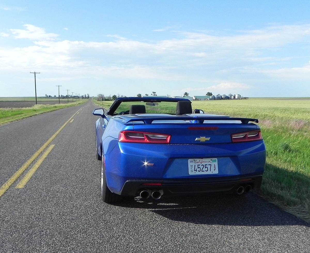 The heavy rear end of the previous-generation Camaro is de-emphasized with the new Camaro's design