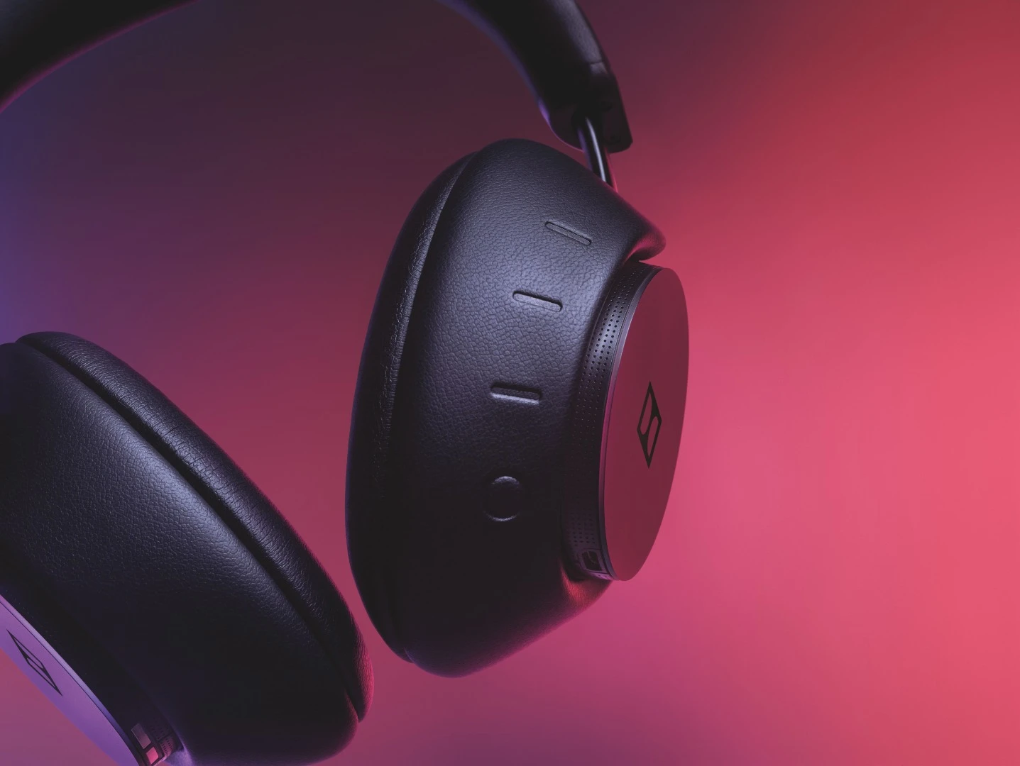 Dolby Dimension headphones can be synced to three different sources, and buttons on the right earcup allow users to switch between them quickly
