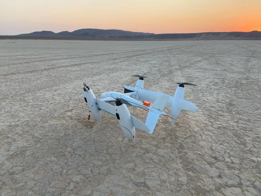 The small prototype, with its 6-ft wingspan folded into a much more compact unit for VTOL operation