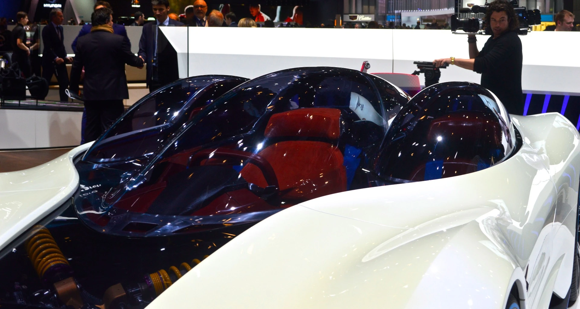 The triple-bubble canopy sits over top the center driver + dual side pod seating arrangement