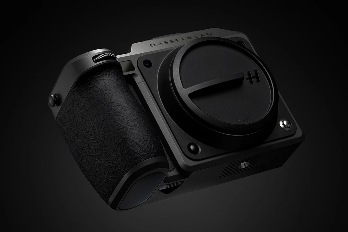The X2D II is a tad lighter at 29.6 oz, and has a new textured graphite gray matte coating along with a more comfortable grip