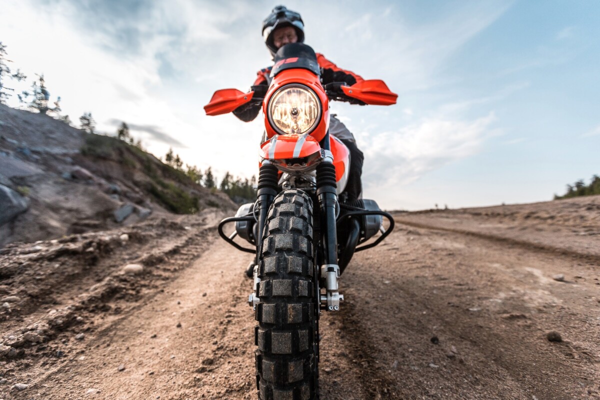Big studded tires provide the traction this R nineT needs to get it off road
