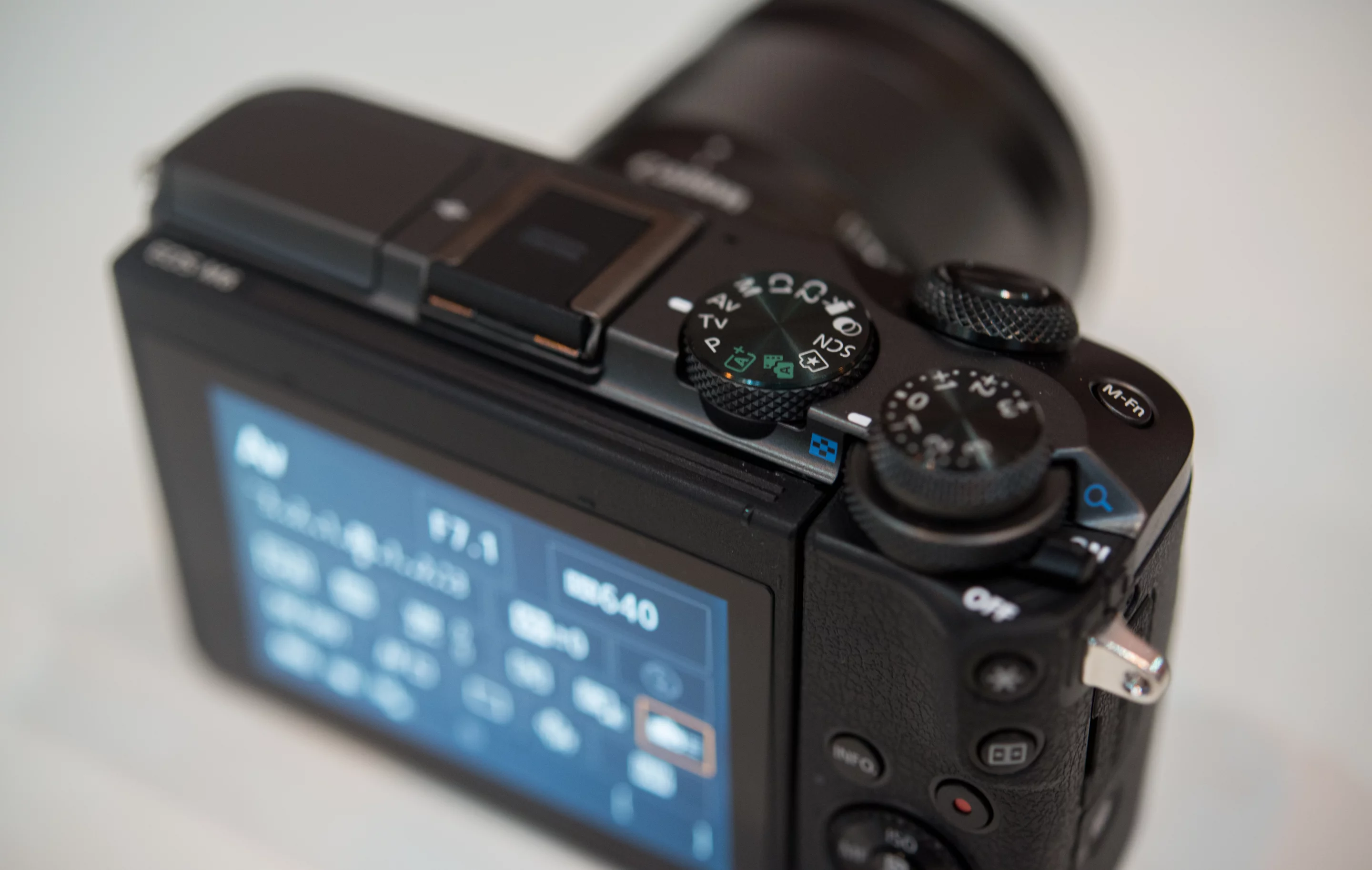 The Canon EOS M6 mirrorless camera offers a balance of manual control and portability, if you don't mind not having a built-in viewfinder