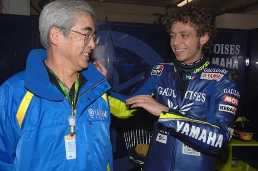 Yamaha President Toru Hasegawa visits the Rossi pit after the race.