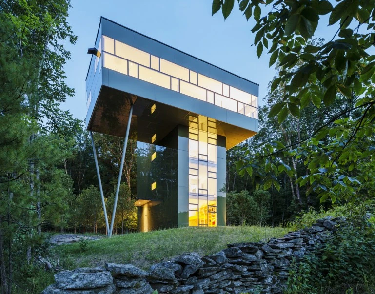 Tower House is a single-family weekend retreat which features a glass facade and a very unusual design (Photo: Paul Warchol)
