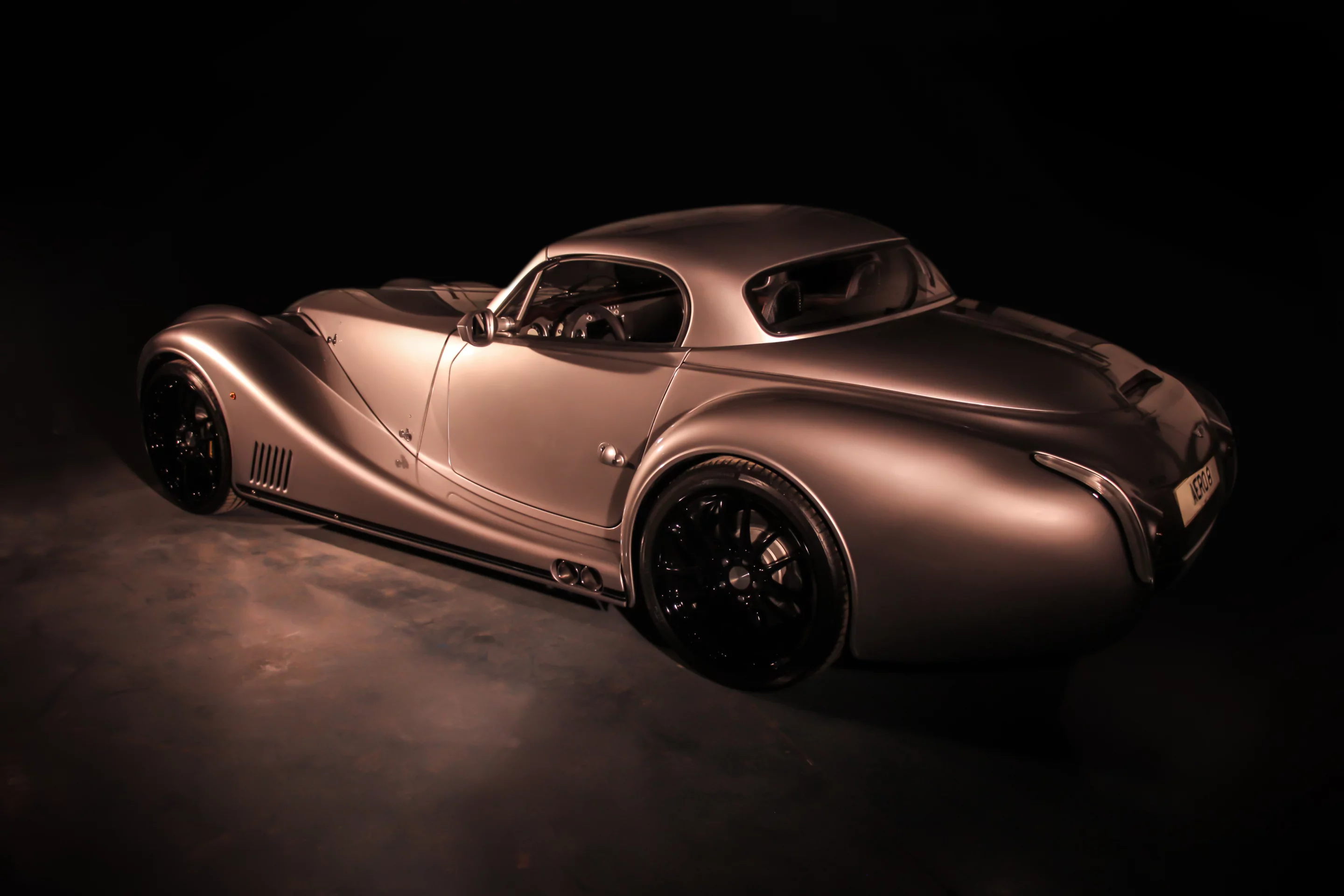 A glamor shot of a silver Aero 8