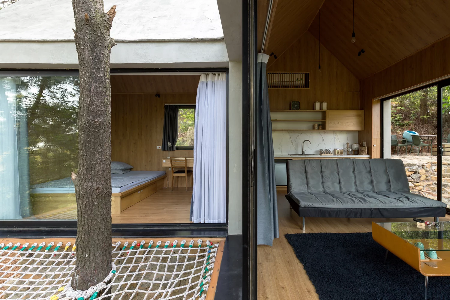 Inspired by treehouses, the home also features a fun exterior net terrace that adjoins both the living area and the master bedroom