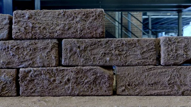 During a process that took 12 months to perfect, the home's bricks were cast in beds of terra cotta sand (Photo: Tommophoto)