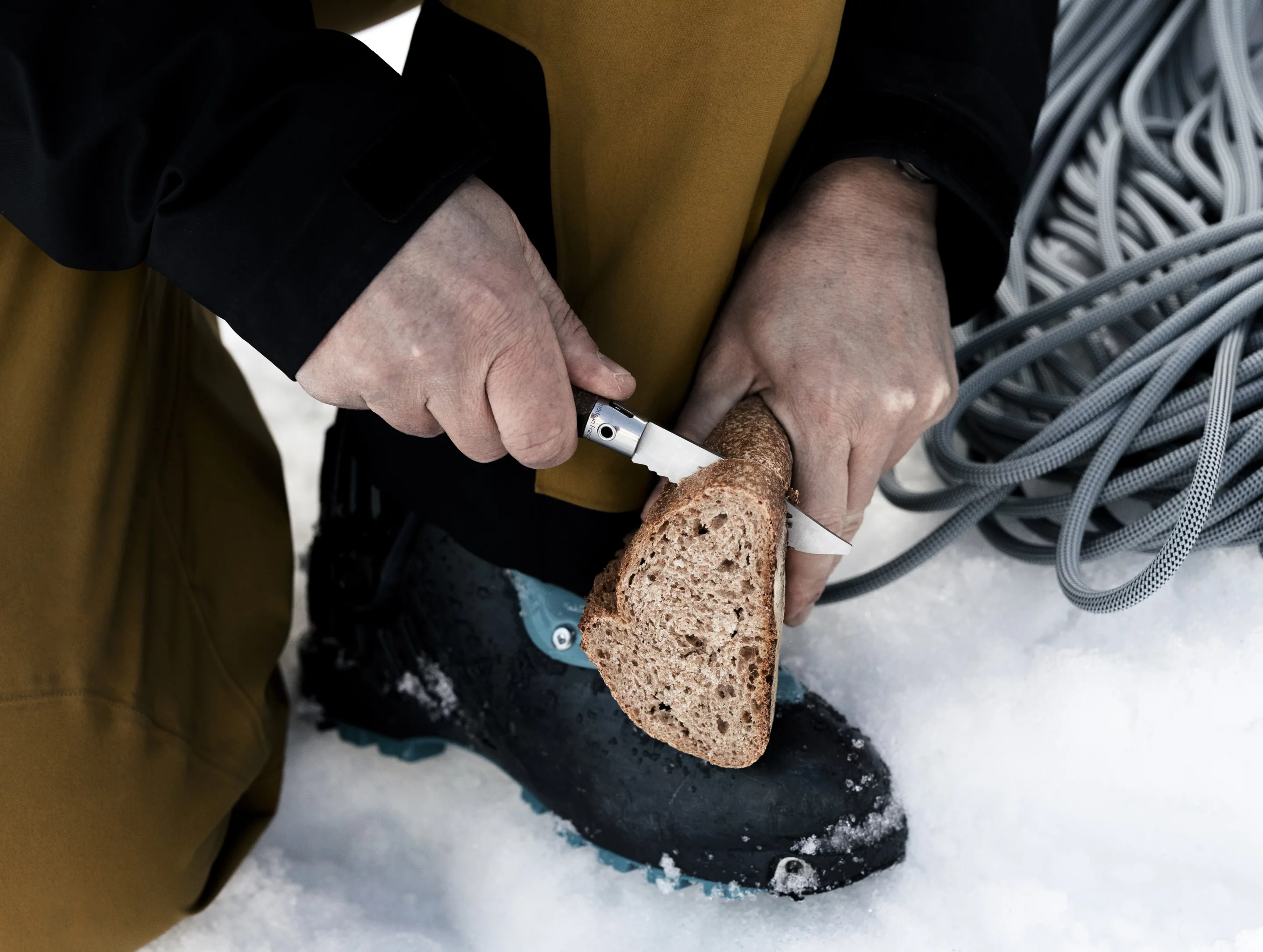 The serrated edge is perfect for slicing rope, cord and ... crusty bread