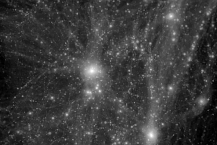 A simulation of the dark matter structure around the Milky Way galaxy – ironically, the brighter spots indicate more dark matter