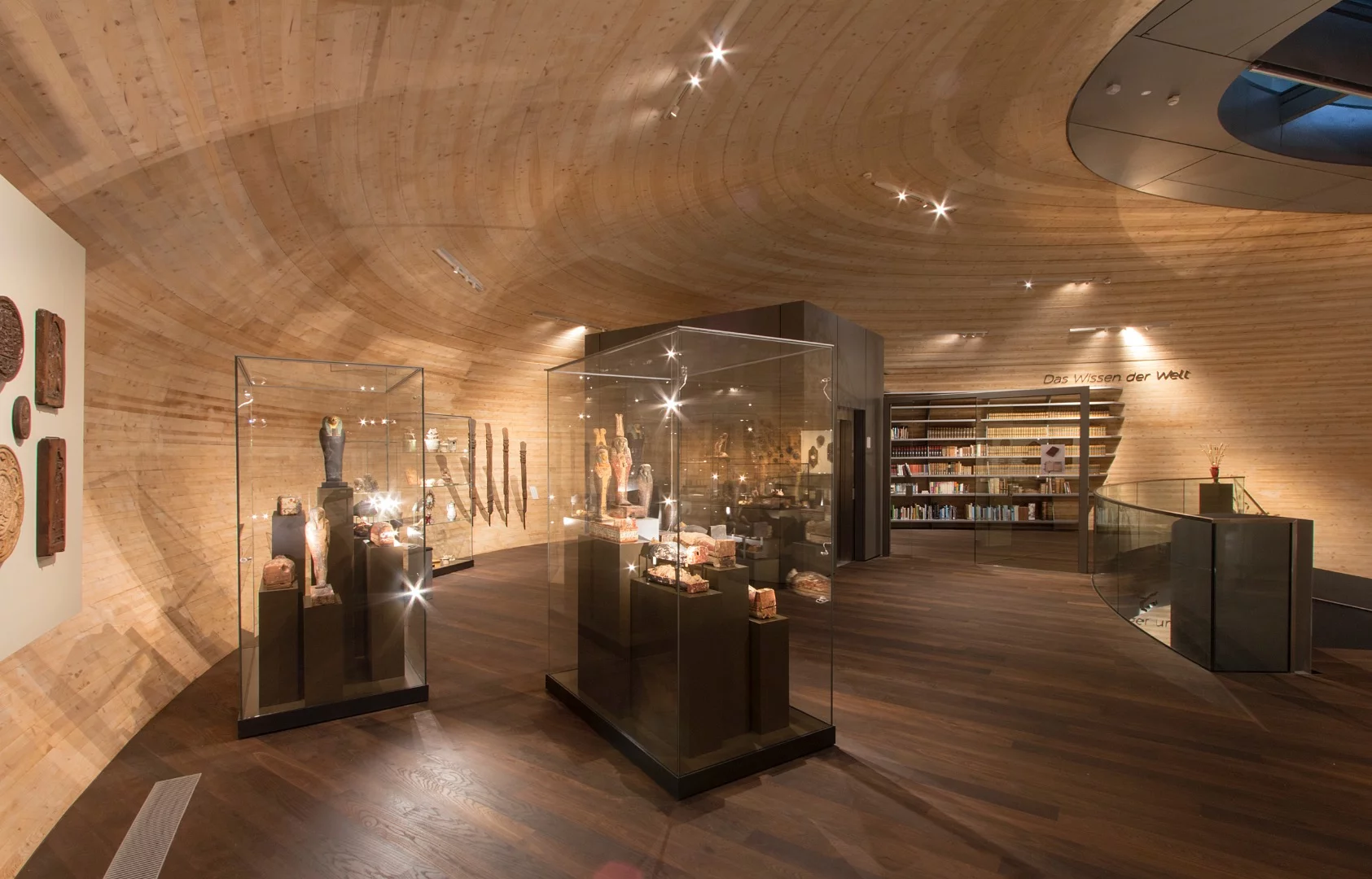 The Paneum's palette of concrete, wood and glass imbues the interior with a more sombre atmosphere than one might expect looking at the building from afar