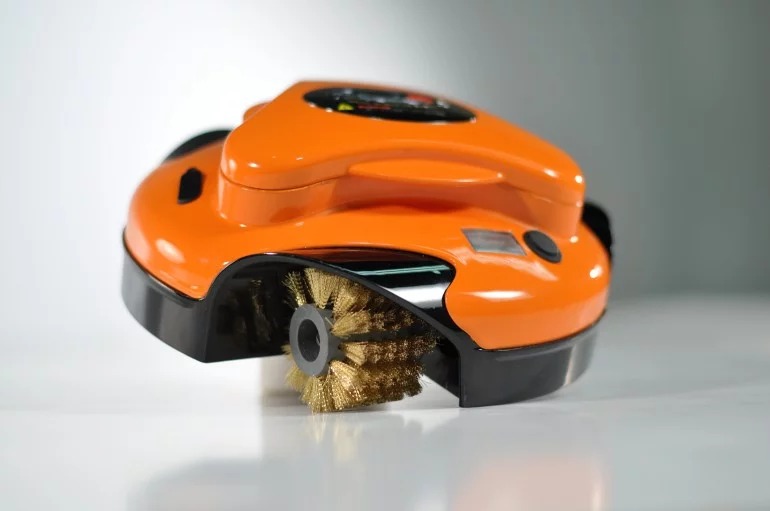 Grillbot is a robot powered by three electric motors that uses three replaceable brushes to scrub clean your grilling surface