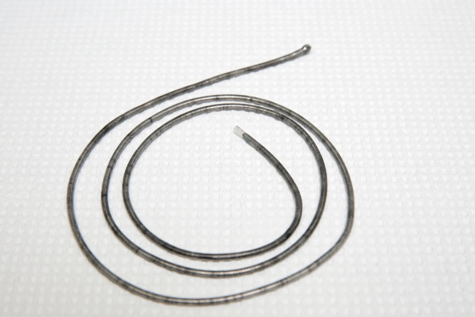 When an electrical current is passed up and down the wire it heats up the alloys inside the tube