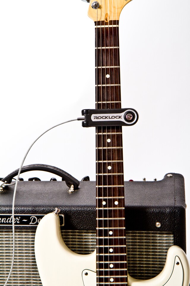 At bar or club gigs, the Rock Lock can be secured to a heavy amplifier to discourage fans from making off with your prized guitar