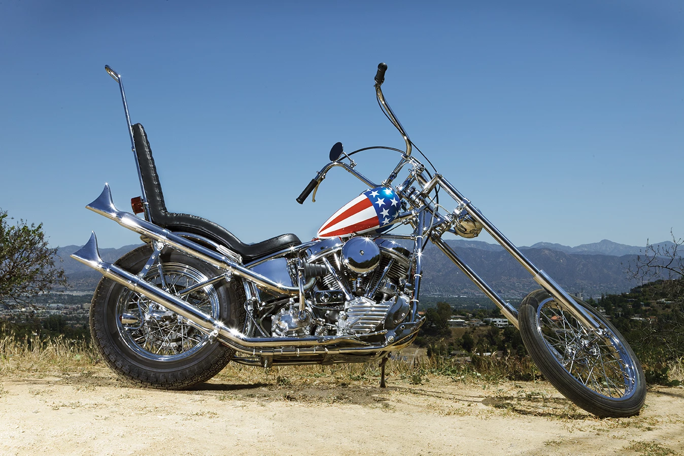 This is the other “Captain America”, sold in 2002 by Dan Haggerty to Midwestern motorcycle parts magnate John Parham. The bike spent many years at the National Motorcycle Museum in Anamosa, Iowa, before Parham sold it to Los Angeles Movie Memorabilia collector Michael Eisenberg in early 2014. Eisenberg took this bike to auction with Profile in History in October 2014, where it hammered for $1.35 million.