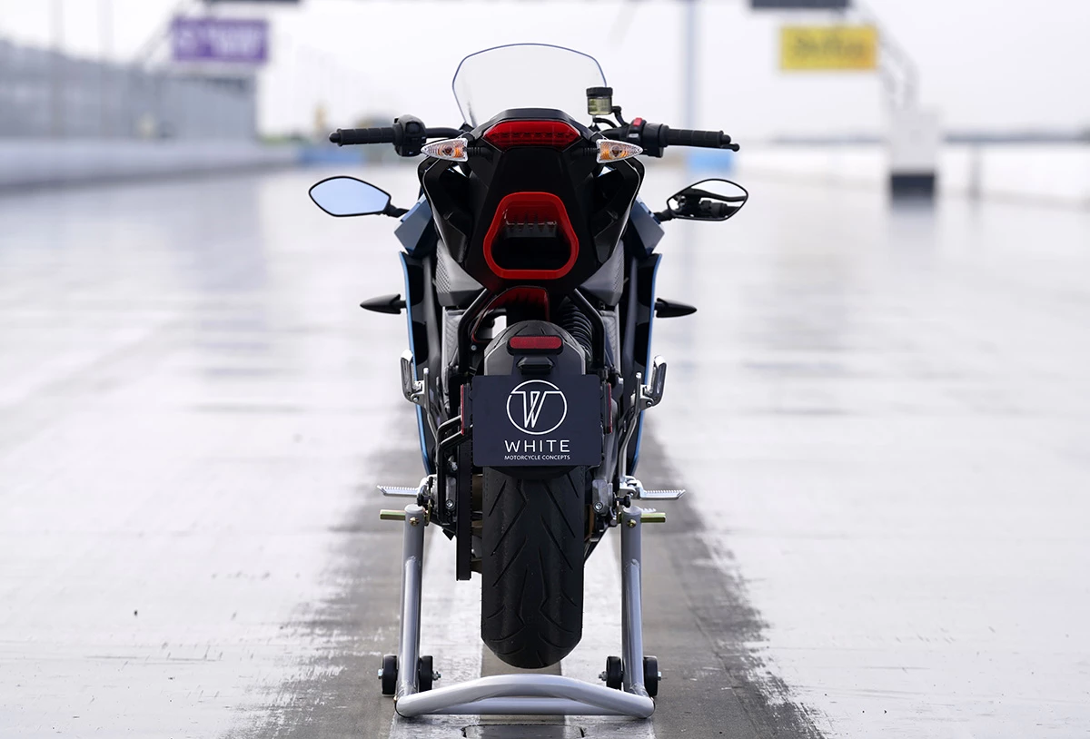 Air flows in from behind the front wheel and out above the rear wheel