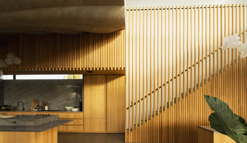 Timber-framed staircase leads to the upper level