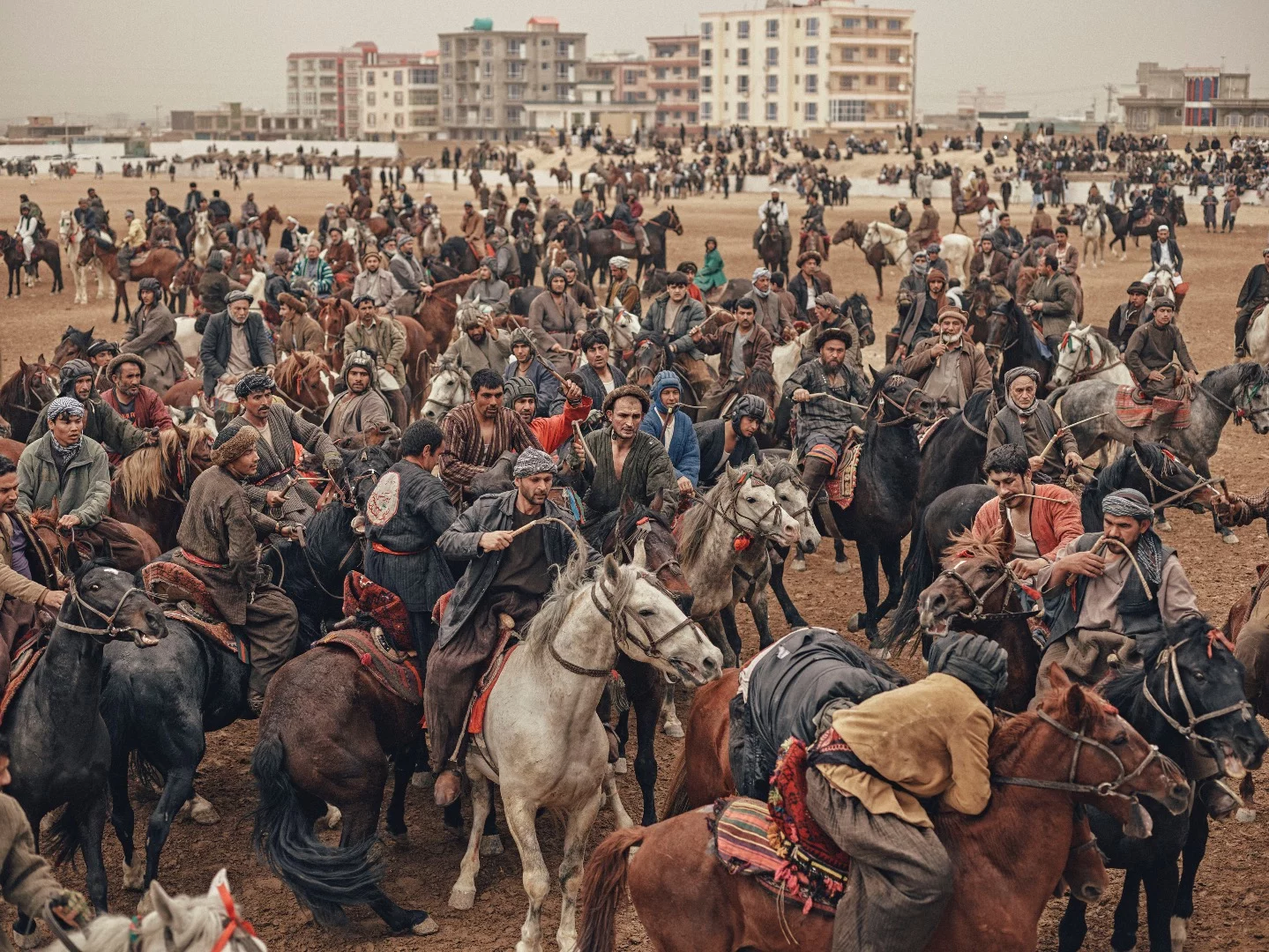 Horsemen fight for a headless calf carcass during a buzkashi match on the day of Nawroz, or Persian New Year, in Mazar-e Sharif, Afghanistan on March 21, 2017