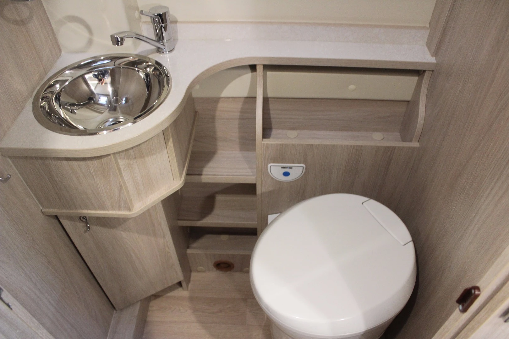 With the swinging wardrobe and other space-saving measures, Rapido is able to include a separate dry toilet compartment, instead of combining shower, toilet and sink into a single wet cell