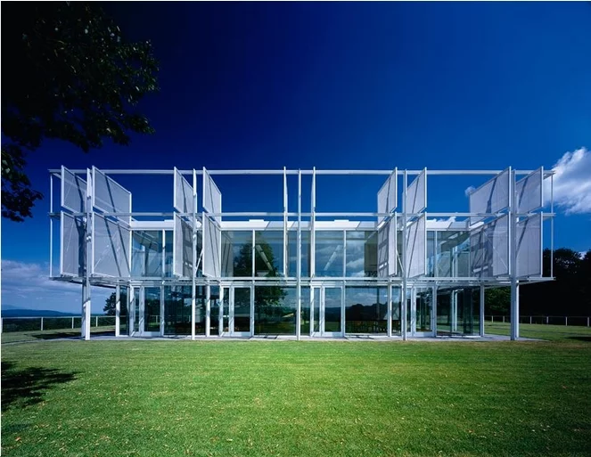 Front view of glass pavilion with sunscreens open (Photo: T. Phifer and Partners)