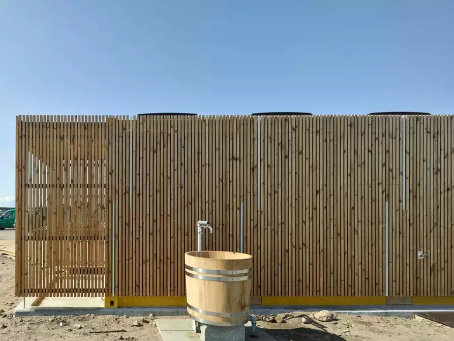 Water Sports Center Halsskov also includes a building with toilets, changing room, storage and outdoor showers