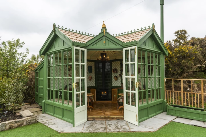 Clutterbuck Lodge, by Martin Gabbutt, is an artist studio and place to have a drink with friends, and is made from recycled furniture. The project, a finalist in the Cabin/Summerhouse category, is one of 22 amazing sheds highlighted in this year's Cuprinol Shed of the Year competition