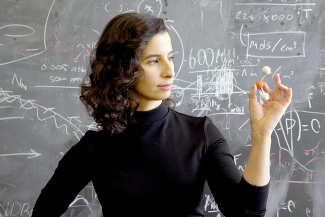 Clara Sousa-Silva with a model of a phosphine molecule