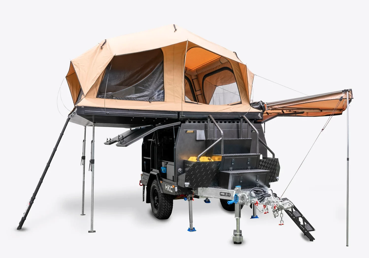 The hardshell rooftop tent opens up to create a dual-bed interior