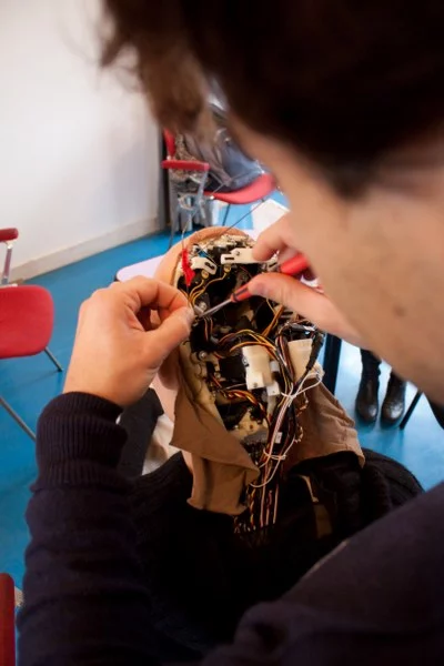 Thirty-two servo motors are integrated in the android skull and neck