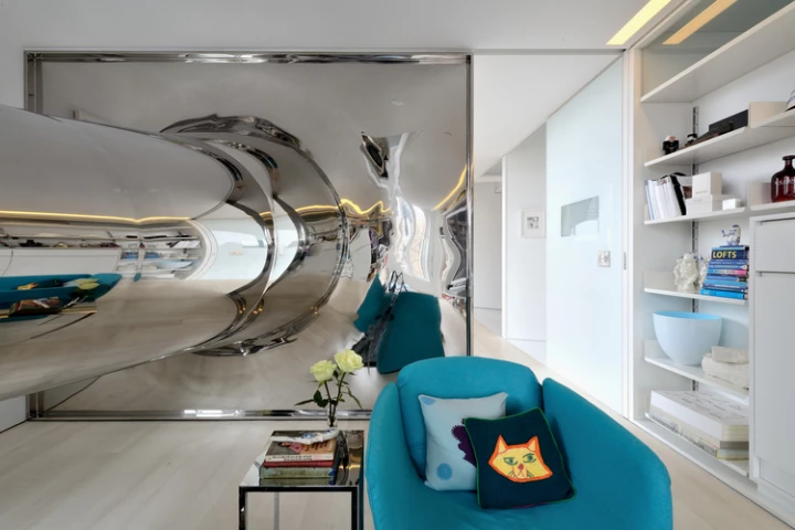 The slide provides a playful point of focus for the inhabitants and any visitors (Photo: David Hoston)