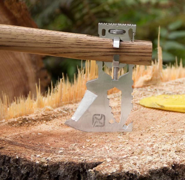 In addition to the axe blade, cut into the surface of the head is a bottle opener, scraper, five wrench sizes, a hex bit driver, a lanyard hole and a carabiner