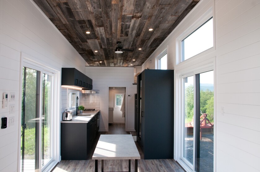 The Baobab features double sliding glass doors on each side of the house