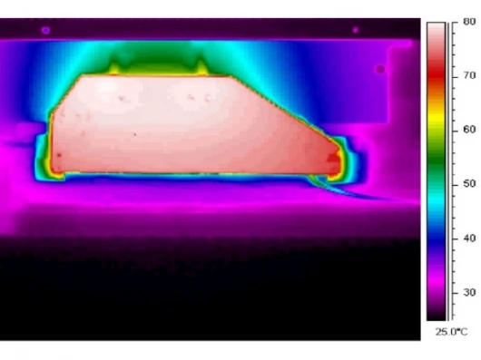 Infra-red image of an optimized EHD-cooled laptop after three minutesImage credit: Tessera