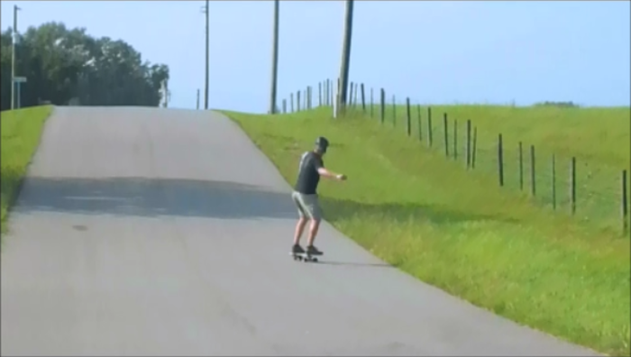 The rider can climb hills with both feet on the board