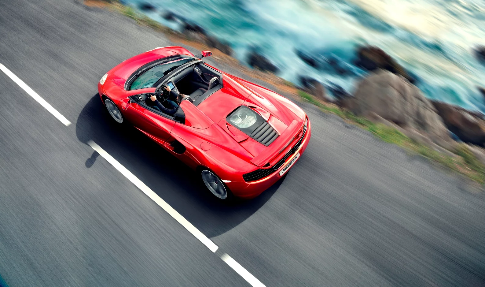 The McLaren 12C Spider boasts the same 24.2 EU mpg (11.7 liters/100 km) fuel efficiency figures as the 12C