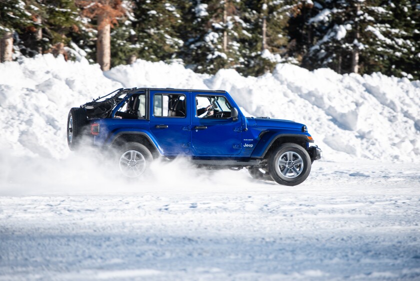 With things in 4H Part-Time, the Jeep Wrangler became a lot of fun to slip and slide, throwing snow and skittering across the ice with glee