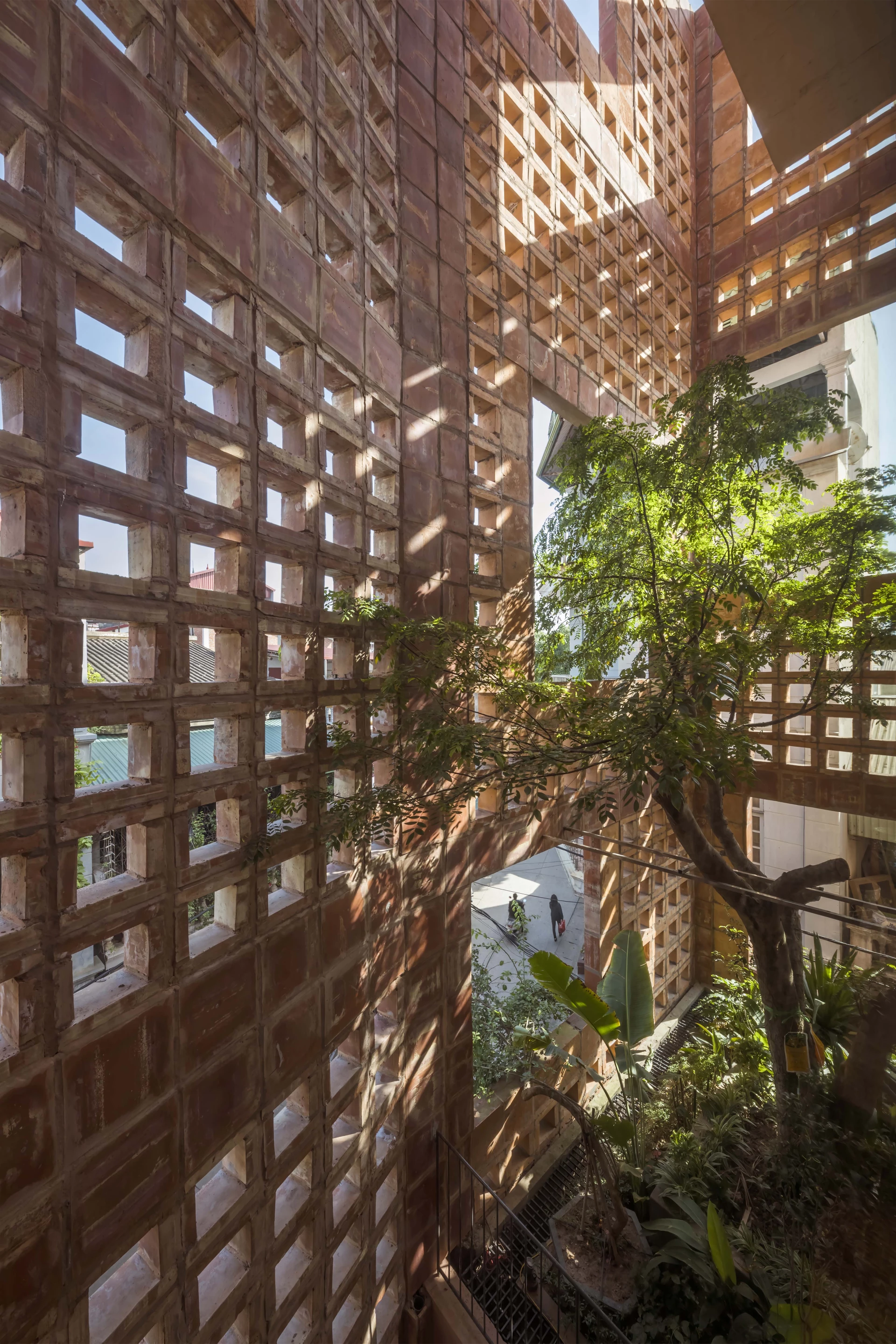 Bat Trang House's ceramic facade is used for shading and helps keep the interior of the home cool, says VTN Architects