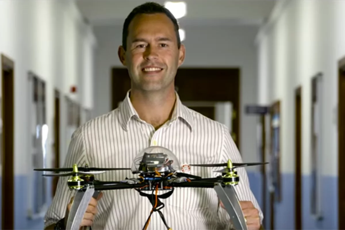 University of Bristol researcher Dr Tom Scott with a landmine-hunting drone