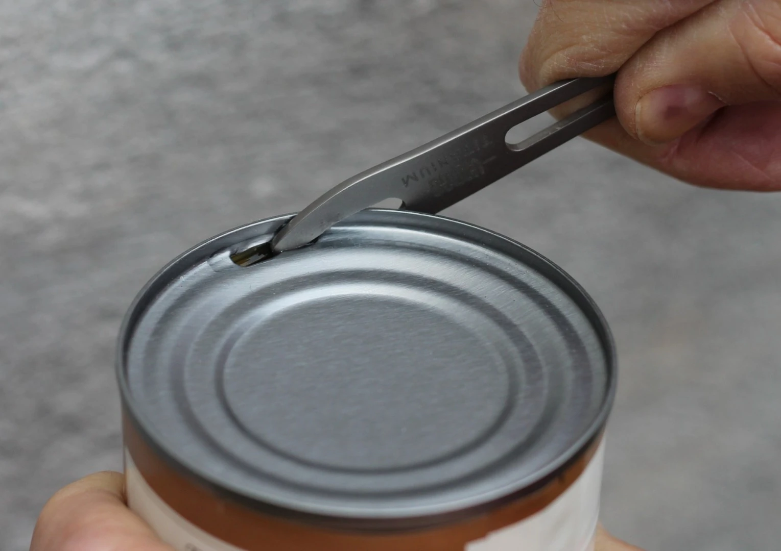 The Titanium Scork also features a can opener