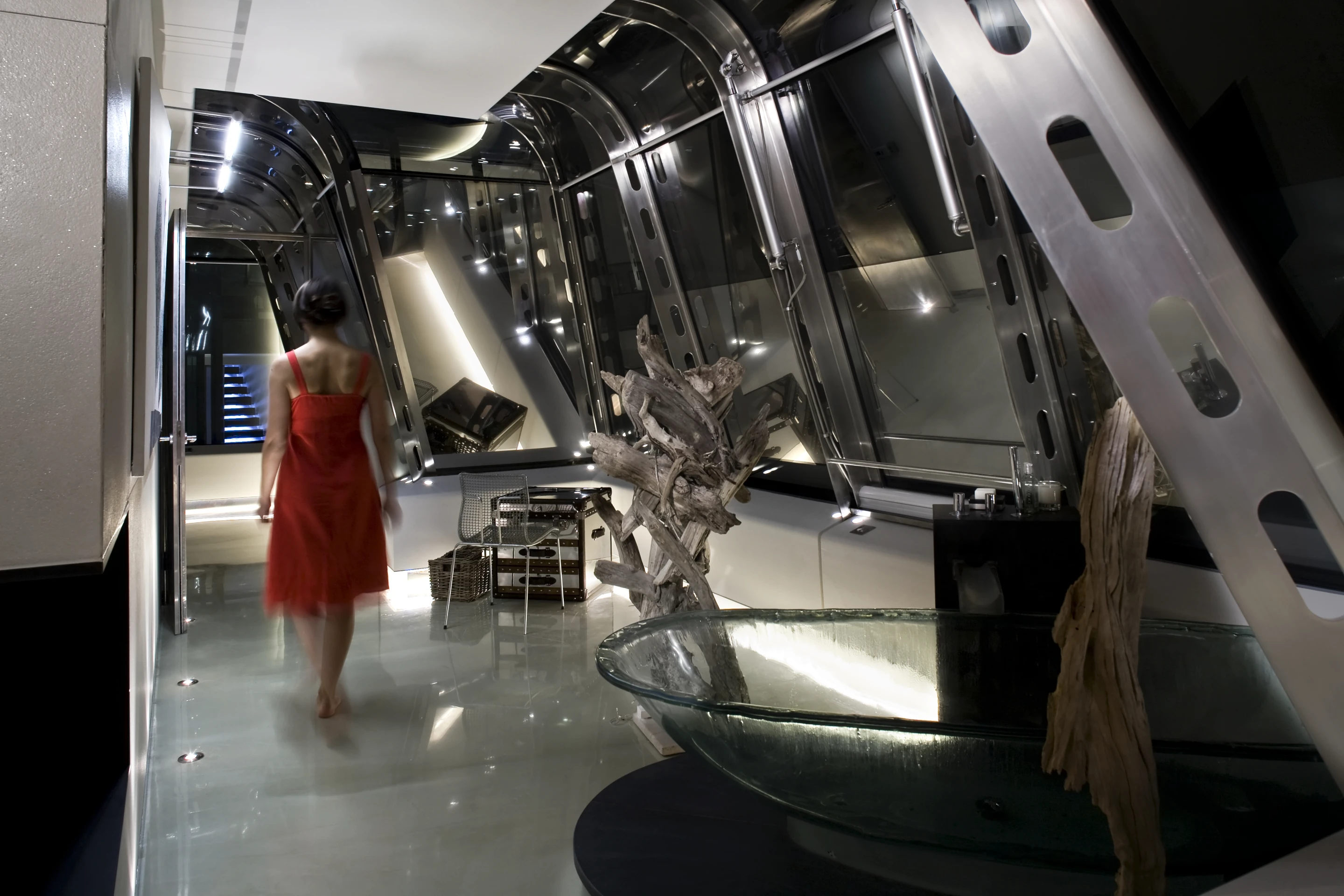 Private access to the property is gained by passing through a Panasonic iris-identification system, and then riding a glass elevator to the top floors