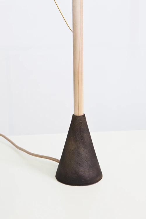 Designed by Mieke Meijer, the Balance Lamp is a wooden LED floor or table lamp that only illuminates when perfectly balanced (Photo: Mieke Meijer)