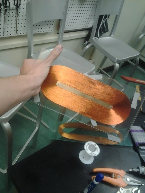 Three football fields of wire to make the coil, which sits between two plastic sheets
